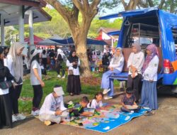 Perpustakaan Keliling Jadi Daya Tarik Tersendiri di Jalan Sehat HUT Sulsel  Sebuah