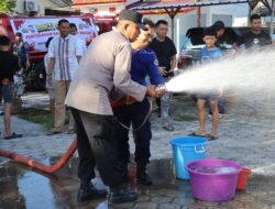 Polres Pinrang Gelar Bakti Sosial Penyaluran Air Bersih Dalam Rangka Hut Bhayangkara Ke 80